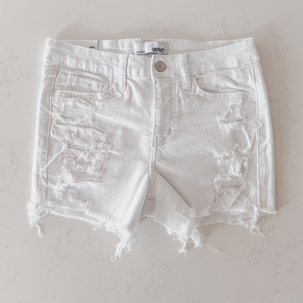 White distressed shorts